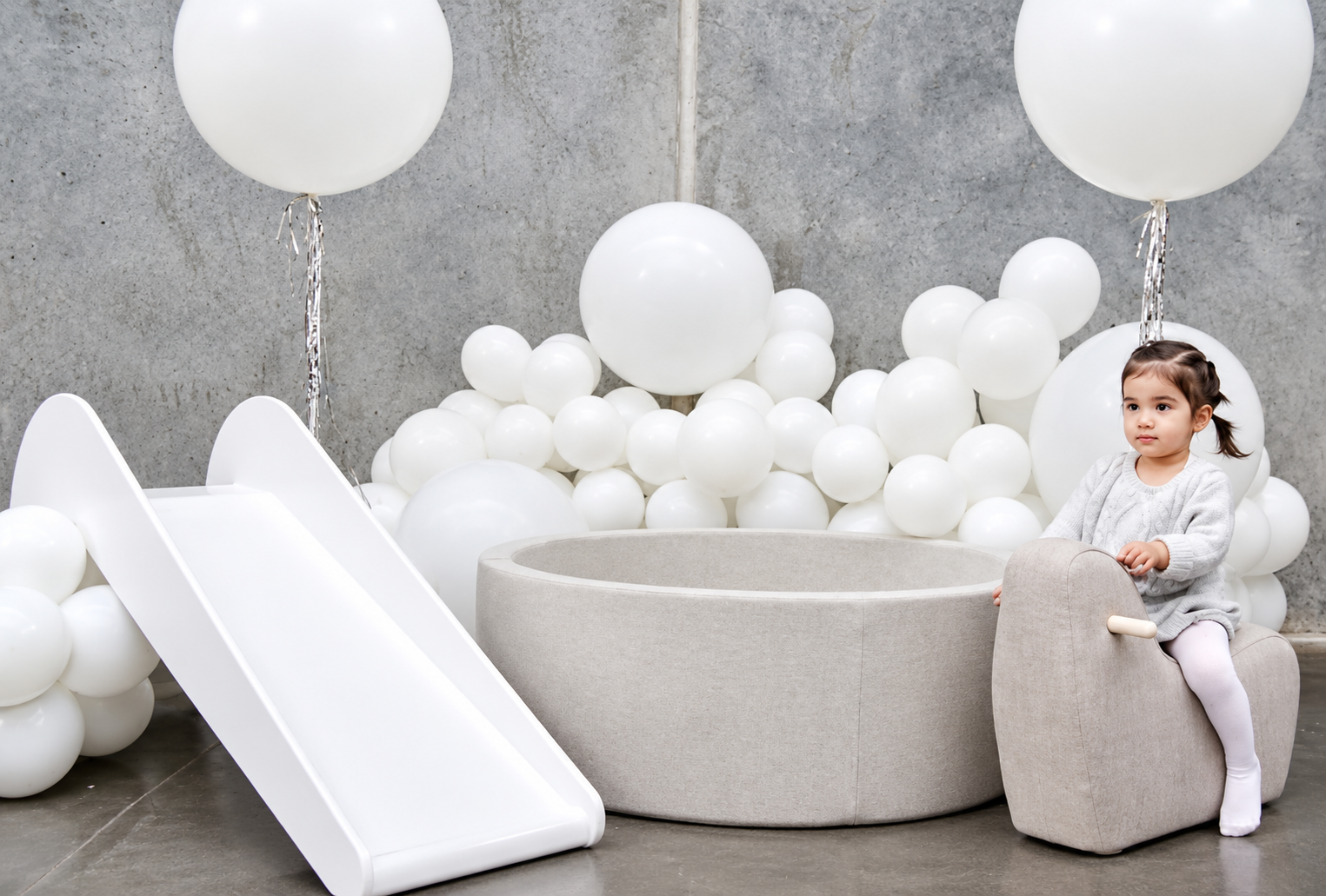 Essential soft play package with ball pit, slide and balloon styling